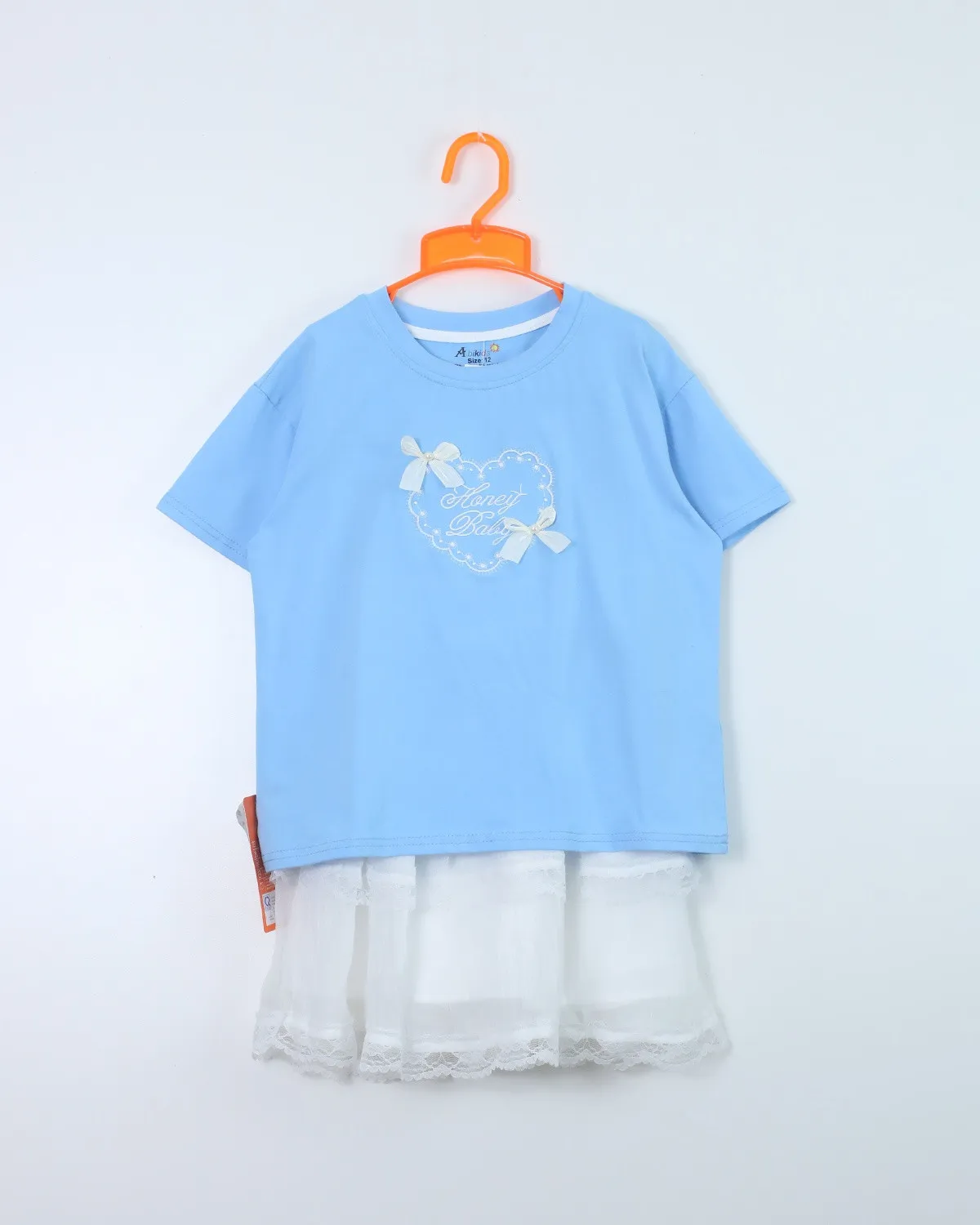 Bộ séc bé gái 26g02 size 12 VL