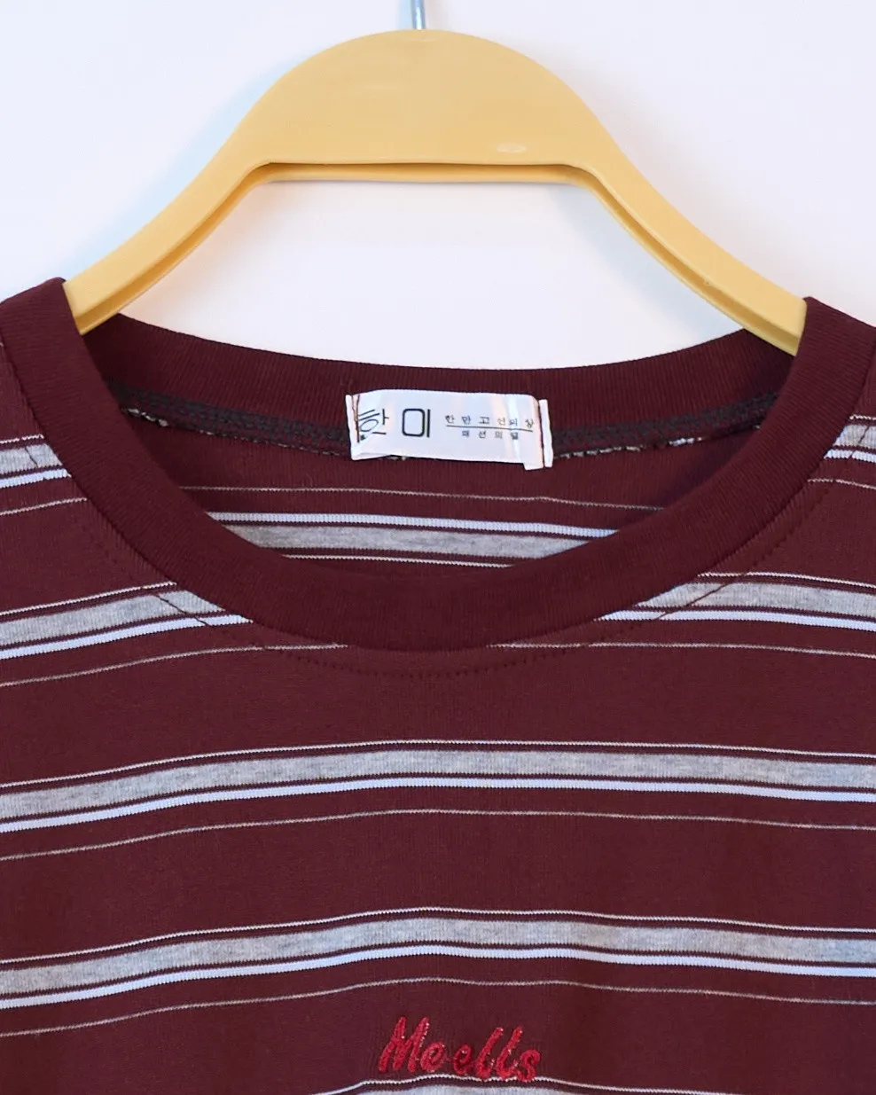 Áo phông nữ cổ tròn kẻ zip Me ells đen H.Thắng