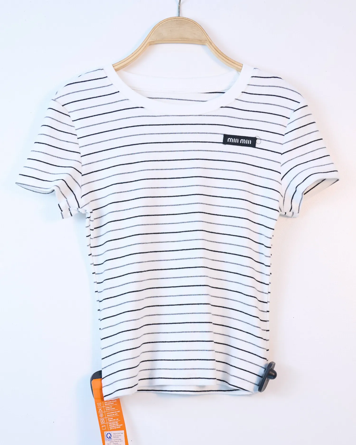 Áo phông nữ cổ tròn kẻ zip nâu H.Thắng