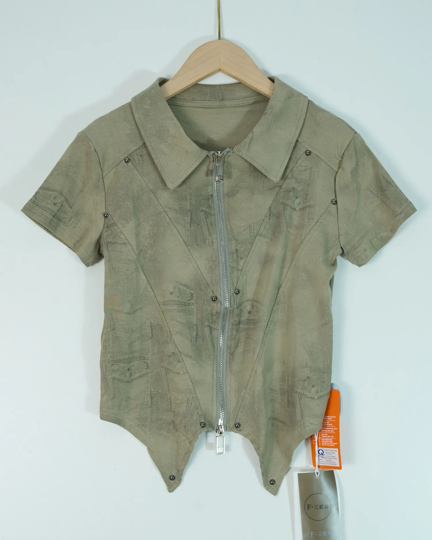 Áo phông nữ cổ bẻ zip 68193 rêu H05.2026.1