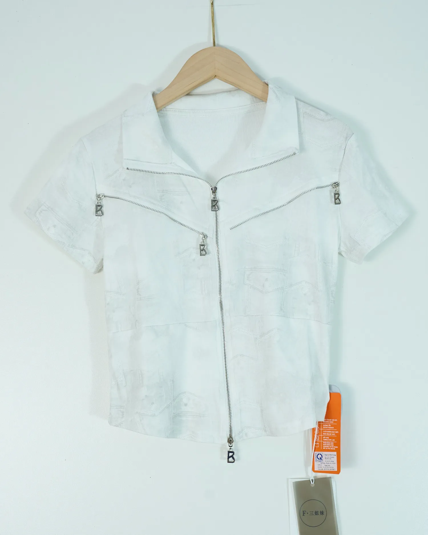 Áo phông nữ cổ bẻ zip 68192 rêu H05.2026.1