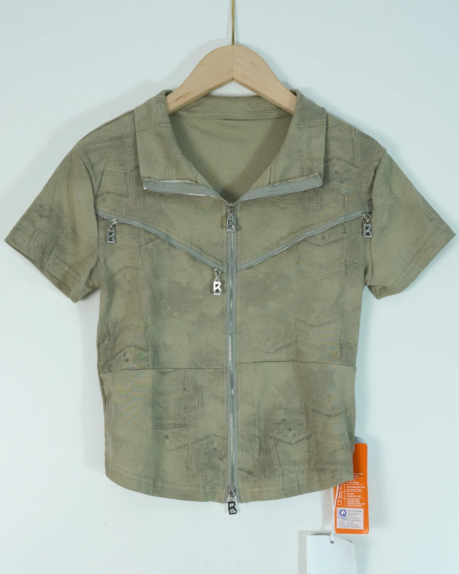 Áo phông nữ cổ bẻ zip 68192 rêu H05.2026.1