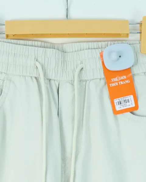 Quần dài nam 869 kem size 33 . AL16 CC