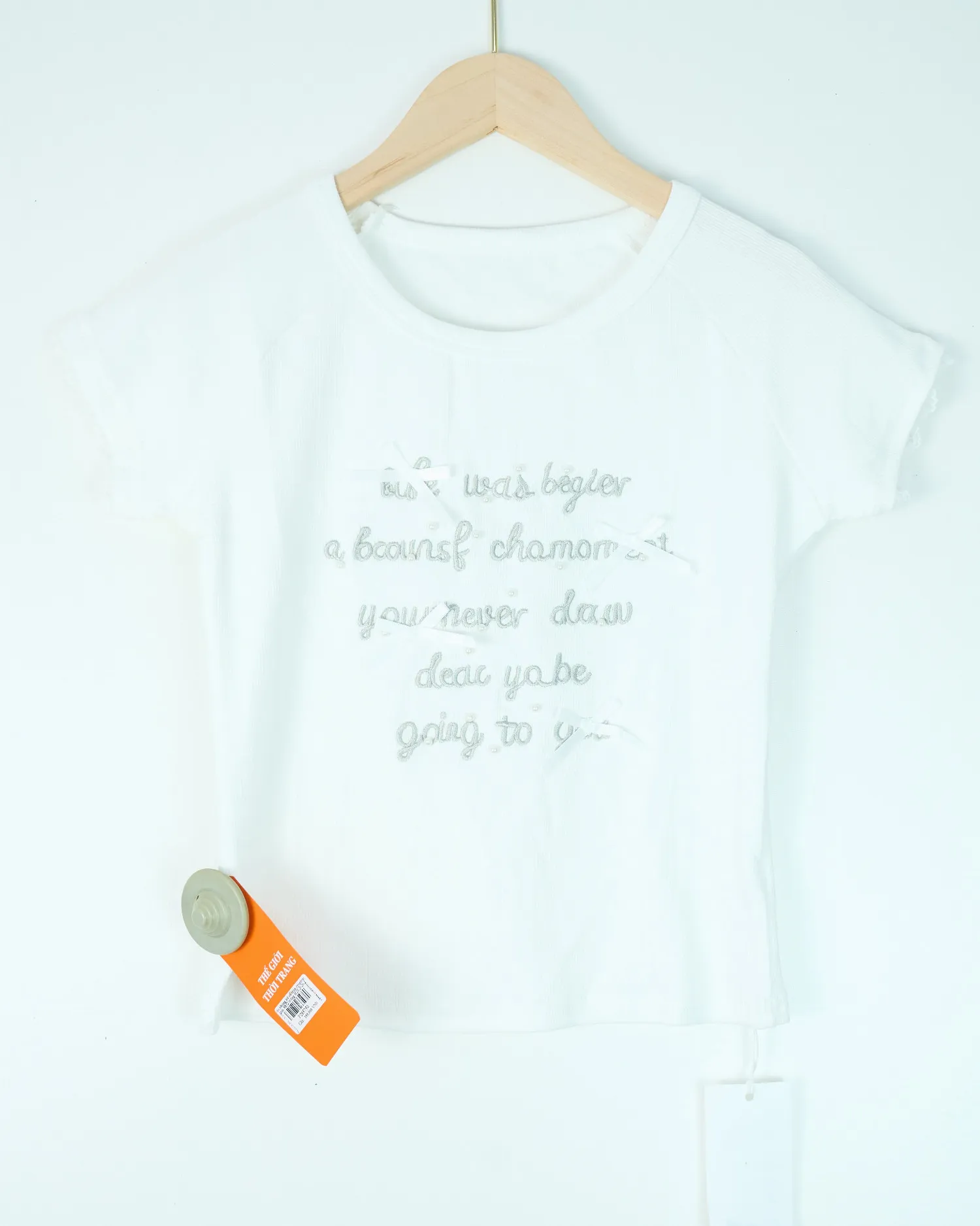 Áo phông nữ cổ tròn croptop tăm 8832 trắng H25.2026.1