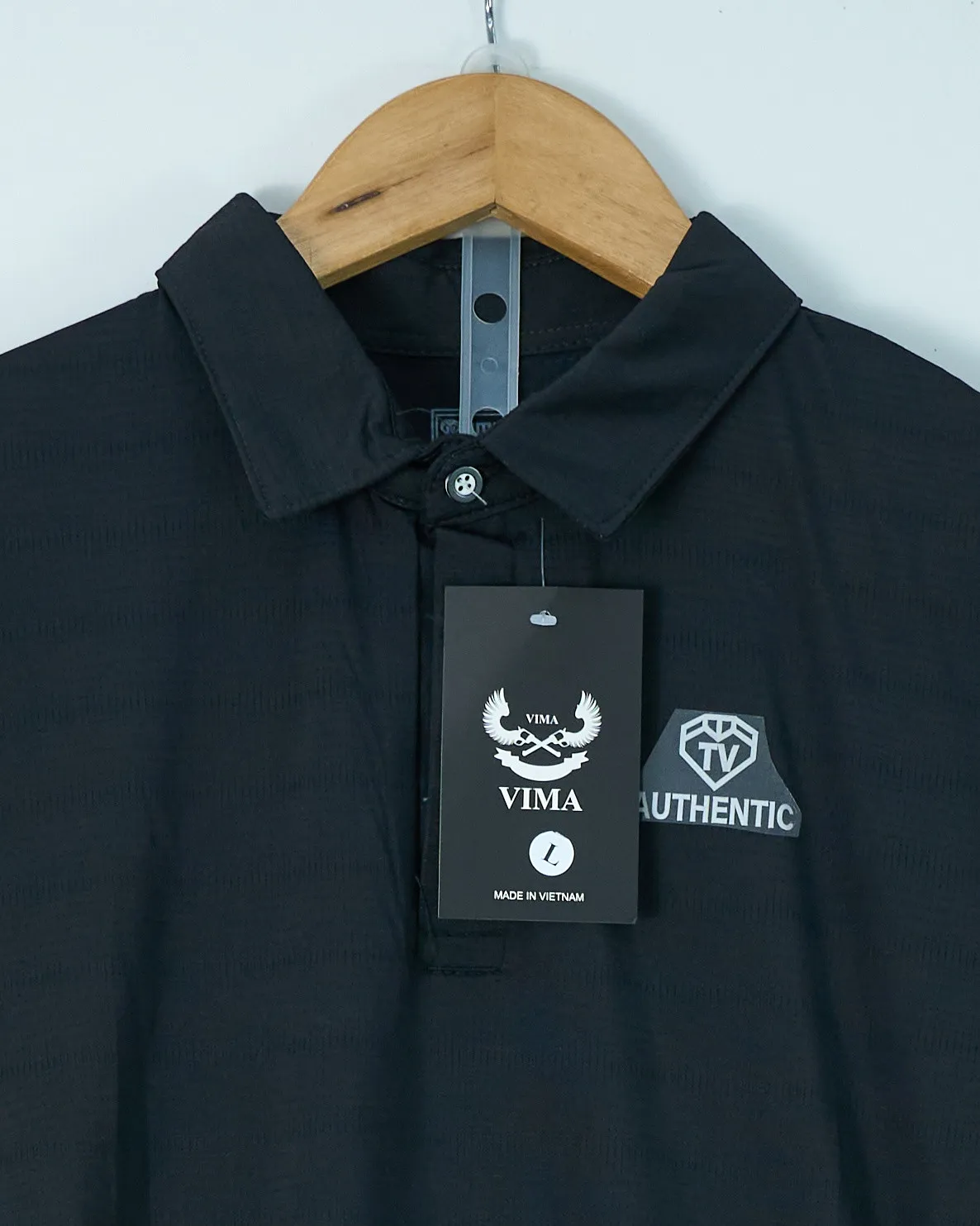Bộ thể thao thông hơi cổ bẻ đen size L. SL