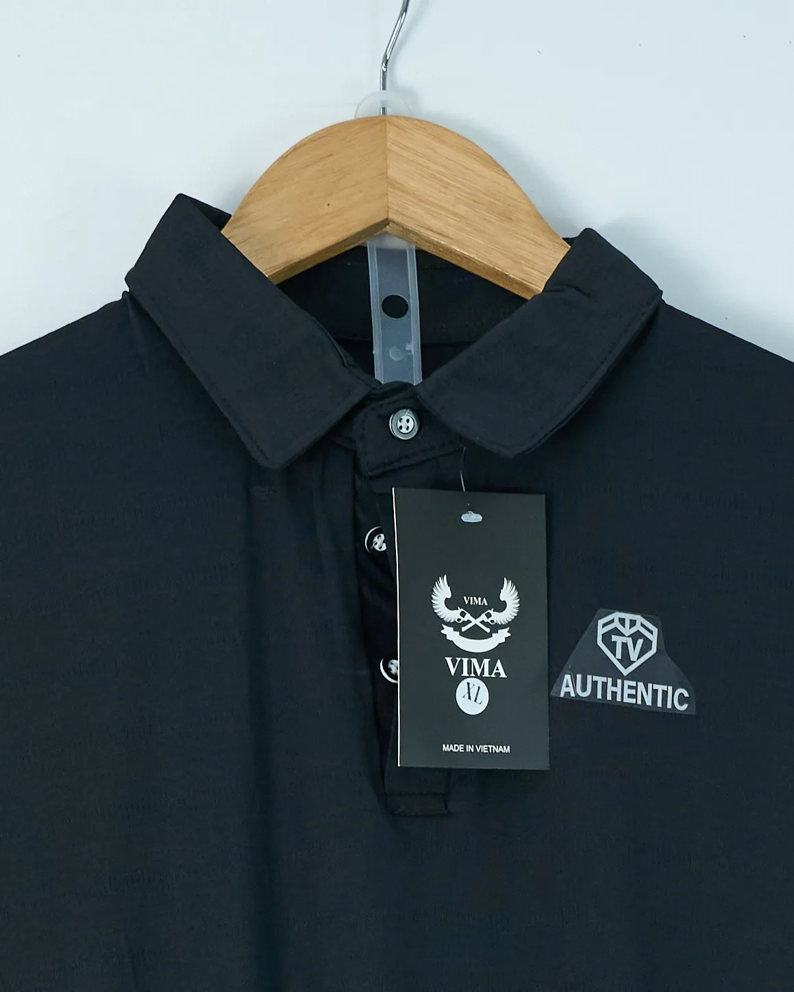 Bộ thể thao thông hơi cổ bẻ đen size XL. SL