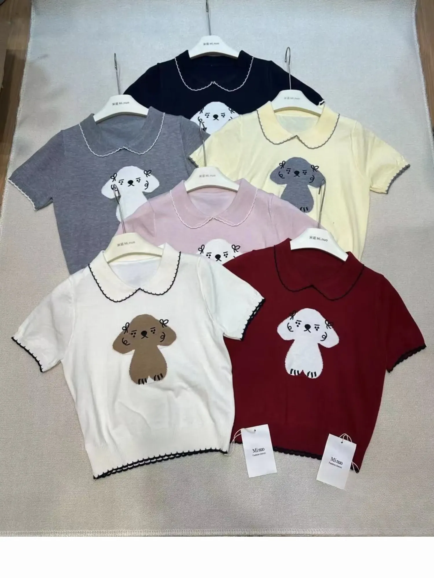 Áo len mongtoghi nữ cổ bẻ 122 than 02.2026D1